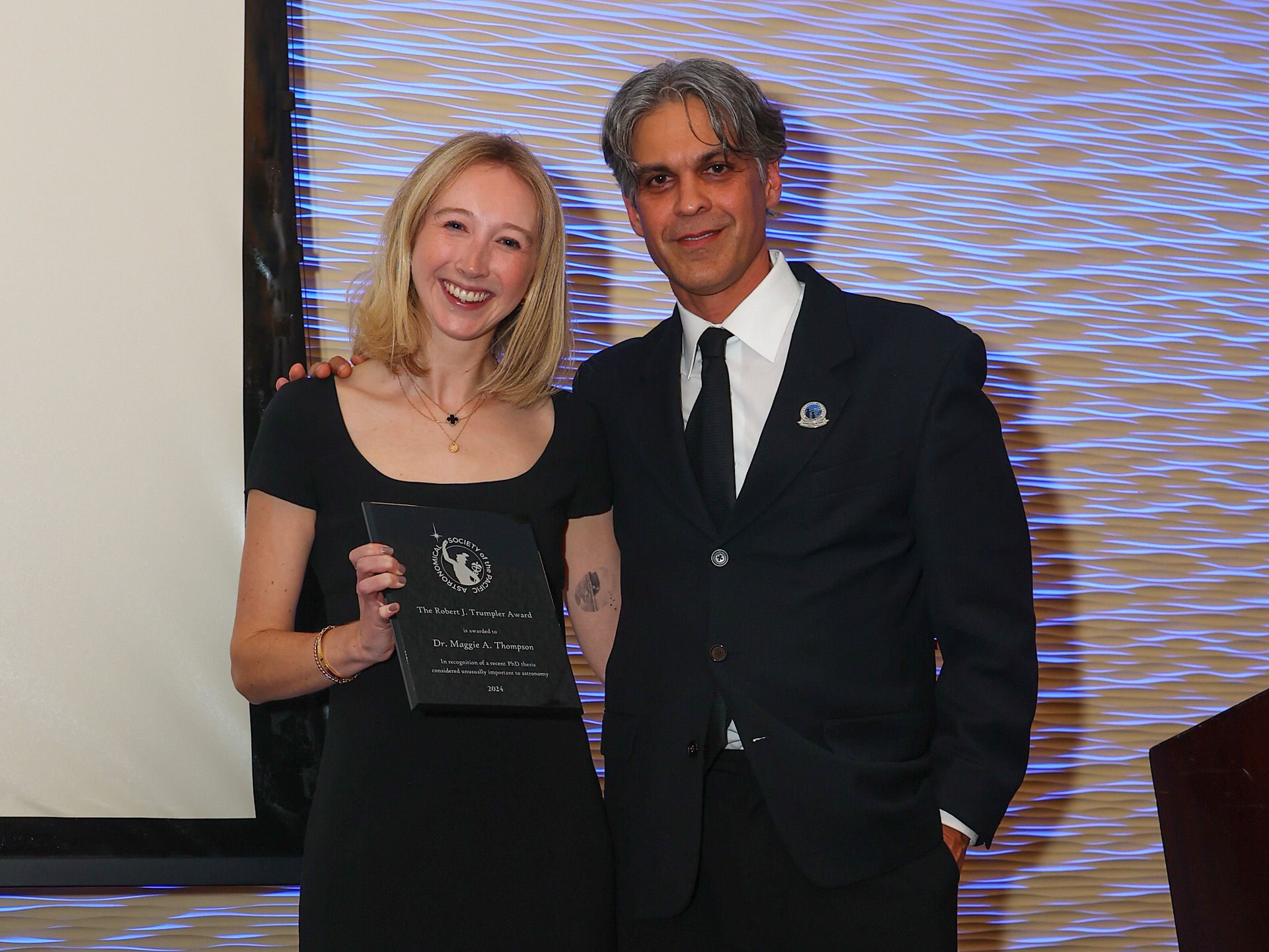 Enlarged view: Dr. Maggie Thompson with her award
